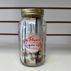 Glass Jar with Gold Lid and Unimates